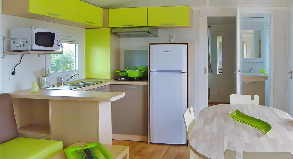 Camping Côte de Granit Rose access beach pros mabo - Mobile home 3 bedrooms pitch 13 kitchen living room - Camping Armor Loisirs